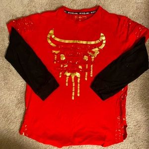 Red, gold and black shirt by Switch